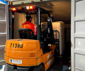 a forklift transporting items